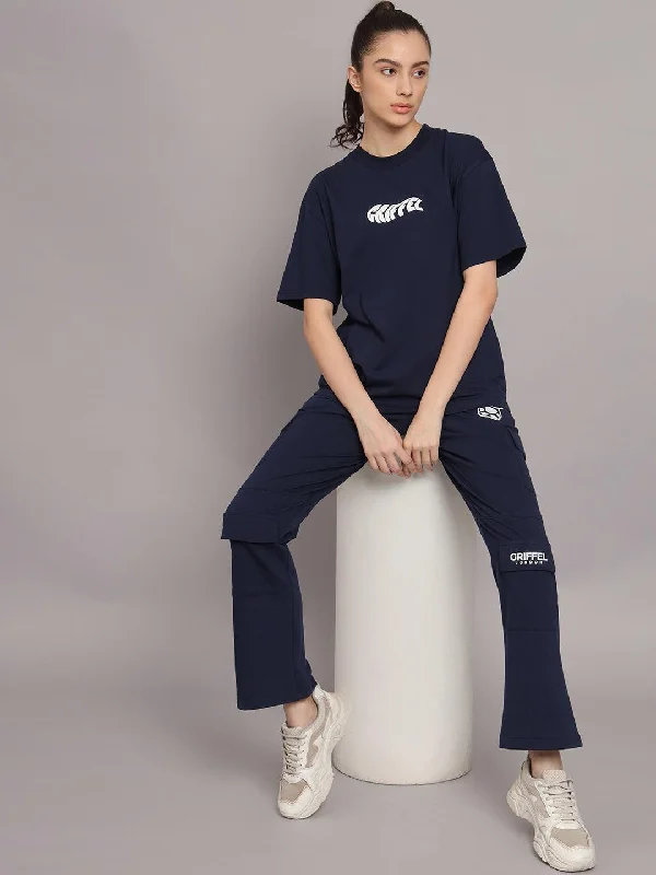 GRIFFEL Women Printed Loose fit Navy T-shirt and Bell Bottom Trackpant Set Denim Fabric Leather Fabric Suede Fabric GRIFFEL Women Printed Loose fit Navy T-shirt and Bell Bottom Trackpant Set Denim Fabric Leather Fabric Suede Fabric